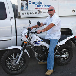 Roy Madigan receives Yamaha TW200 Dual Purpose motorcycle