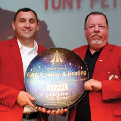 Tony Petrolle (left) and Randy Hamilton (right) of GAC Cooling & Heating accepted the Bryant Dealer of the Year award at the 2013 Bryant Dealer Rally.