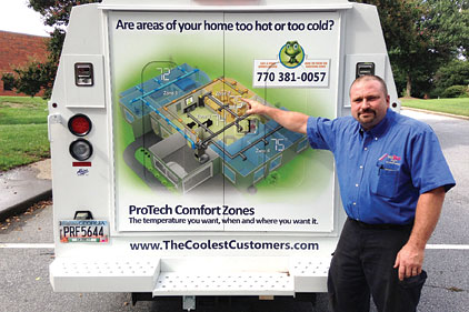 Marty Gildemeyer shows off the ProTech Comfort Zones, an online app which he has put as a wrap on several of his companyâs trucks. He said heâs recently sold three zoning systems based solely on people seeing the trucks.