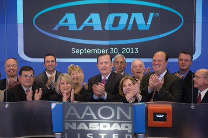 Norm Asbjornson, president and CEO of AAON, Inc., rang the opening bell of the NASDAQ Stock Market in celebration of the 25th anniversary of AAON as a public company.