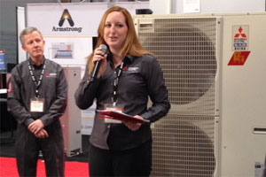 Mitsubishi Electric's Pam Androff, product manager, commercial equipment, discussed the new H2i technology during a press conference at the AHR Expo on Tuesday.