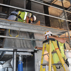 Inside the Control and Support Building of the Blue Grass Chemical Agent Destruction Pilot Plant, HVAC ductwork testing is under way to ensure high quality installation standards. (Photo courtesy of PEO ACWA, https://flic.kr/p/de2XdK)