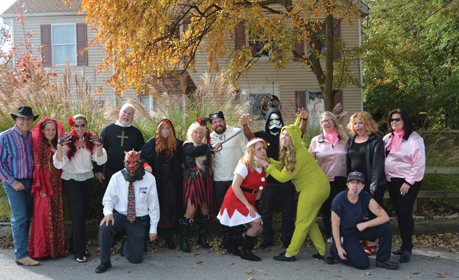 The staff at Oliver Heating, Cooling, Plumbing, Electrical in Morton, Pennsylvania, dress up in work-appropriate Halloween costumes.
