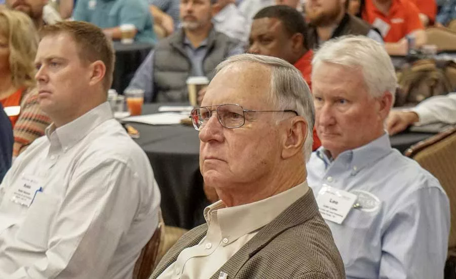 Contractor Larry Taylor listens to a speaker at the ACCA Leadership Conference. - The ACHR News
