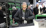 David Stroud, service tech at Jake’s Heating & Cooling at the Hilmor booth. - The ACHR News