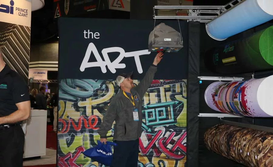 Some companies got creative in their booth designs, like this one pictured, where they used street art to draw attendees in and innovative duct designs to keep them there. - The ACHR News