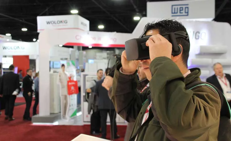 Virtual reality glasses let Rehaubooth visitors see behind the walls and under the floor. - The ACHR News