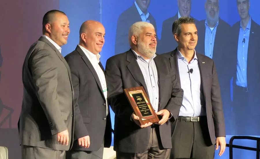 HARDI CEO Talbot Gee (left) and HARDI Executive Director, Mexico, Guitze Messina flank HARDI Mexico team members recognized for the association's development in that country.