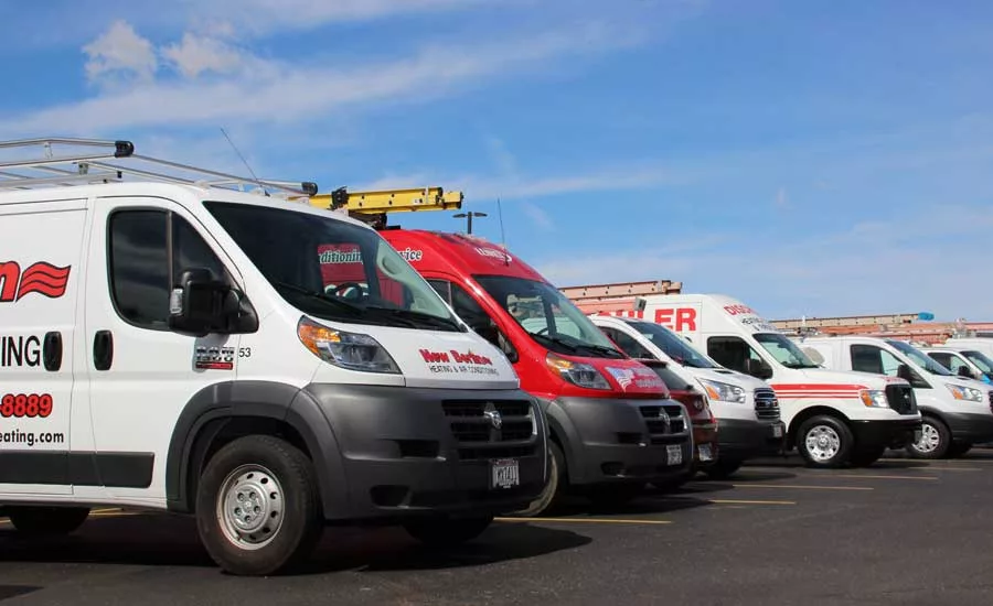 2019 Lennox VisionTECH Conference: Contractors line up their trucks in the parking lot for the service van competition. - The ACHR News