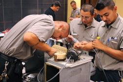 technicians perform a training exercise