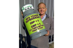 Ken Strong shows a canister of HFO-1234ze being used in chillers