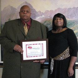 Michael Leonard receives The NEWS' 2012 Best Instructor award