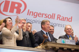 Ingersoll Rand chairman and CEO Michael W. Lamach (middle, with gavel) rang the closing bell of the New York Stock Exchange (NYSE) in celebration of two company milestones -- the 100th anniversary of Trane and 75th anniversary of Thermo King.