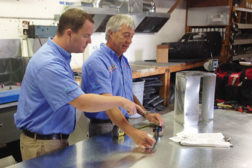 Father Bill Smith (right) and son Travis Smith work together at Sky Heating & AC in Oregon.