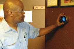 A technician from Magic Touch Mechanical in Mesa, Ariz., adjusts a Nest Learning Thermostat. When troubleshooting a thermostat, Magic Touch CEO Rich Morgan said he first asks who installed it and when. (Photo courtesy of Magic Touch Mechanical)