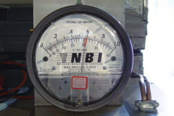 A manometer can be used to emphasize high static pressure based on the position of the needle as testing is performed. 