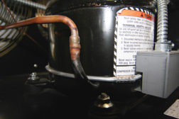 The crankcase heater is designed to help combat refrigerant migration.
