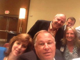 Dick Foster, ZoneFirst, (center) snaps a selfie at the Air-Conditioning, Heating, and Refrigeration Institute (AHRI) Spring Meeting in hopes of going more viral than Ellen DeGeneresâ?? Oscar photograph.