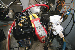 Figure 1. Frost coming back to an air-cooled compressor. Evaporator has more than nine degrees of superheat. Compressor has more than 25 degrees of total superheat.  (Photo courtesy of Ferris State University)