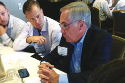 Emerging Leader mentor Bud Mingledorff, owner and chairman, Mingledorffâ??s Inc., Norcross, Georgia, leads a small group discussion with several attendees at HARDI's Emerging Leaders debut conference.