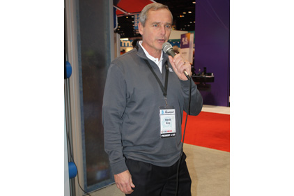 Harold Karp, CEO, Tecumseh Products Co., Ann Arbor, Michigan, introduces the companyâ??s revamped, enhanced compressors during a press conference at the 2015 AHR Expo in Chicago.