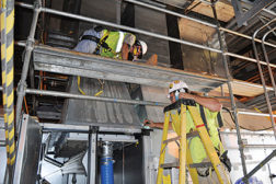 Inside the Control and Support Building of the Blue Grass Chemical Agent Destruction Pilot Plant, HVAC ductwork testing is under way to ensure high quality installation standards. (Photo courtesy of PEO ACWA, https://flic.kr/p/de2XdK)