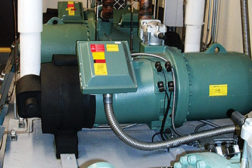 Two 11-story medical office buildings in California were converted from R-22 systems to R-134a, and eight high-efficiency Bitzer 150-ton screw compressors were specified as part of the conversion.
