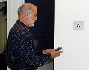Peter Kusterer, owner, Air Comfort For Homes, Raleigh, North Carolina, sets a customerâ??s heat pump balance point as part of his checklist for a homeowner.