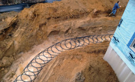 SLINKY COILS: The all-geothermal neighborhood of Rivera Greens uses slinky coils, which are stacked in a horizontal trench. Photo courtesy of WaterFurnace