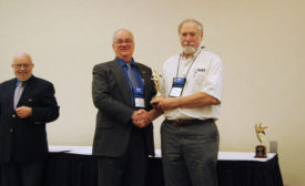 MEMBER OF THE YEAR: Robert J. Sherman, (right) receives the RSES Member of the Year Award from RSES international president Harlan Krepcik (left).