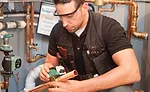 Anthony Tosco, owner and operator, Avanti Plumbing, Heating, and Cooling Inc. in Collegeville, Pennsylvania, prepares to install a Taco Zone Sentry zone valve.