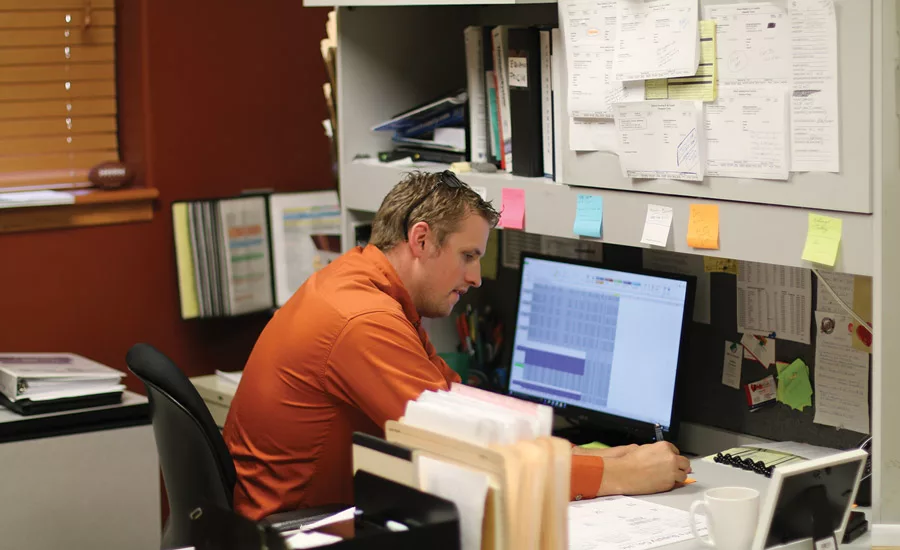 Dan Krygsheld, sales manager, documents yet another successful service call.