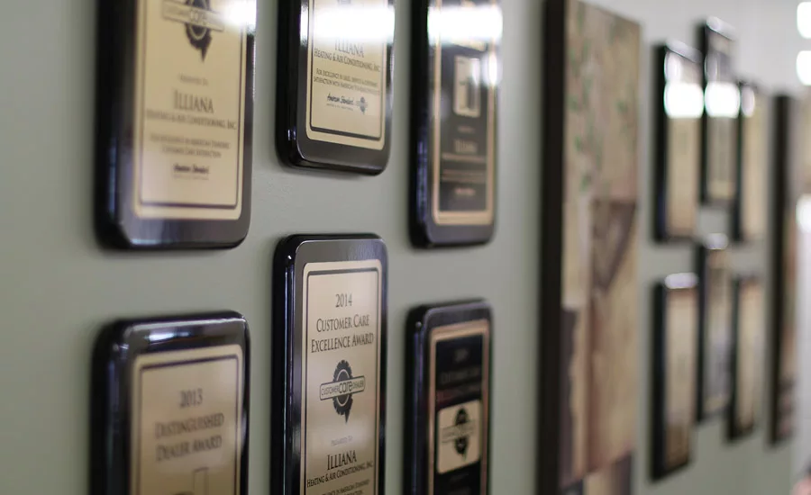 The walls at Illiana Heating & Air Conditioning are decorated with numerous awards the companyÃ¢â¬â¢s accumulated over the last 28 years.