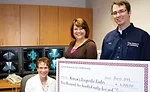 As part of one of IllianaÃ¢â¬â¢s charitable efforts, general manager Kevin Frump (right) presents a a $4,295 check to the WomenÃ¢â¬â¢s Diagnostic Center.
