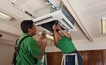 Ceiling cassettes, which were installed before drop ceilings were added, serve classroom spaces.