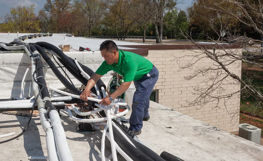 Most refrigerant lines at St. James were double insulated and run across the buildingâââ‰â¢s flat roof.