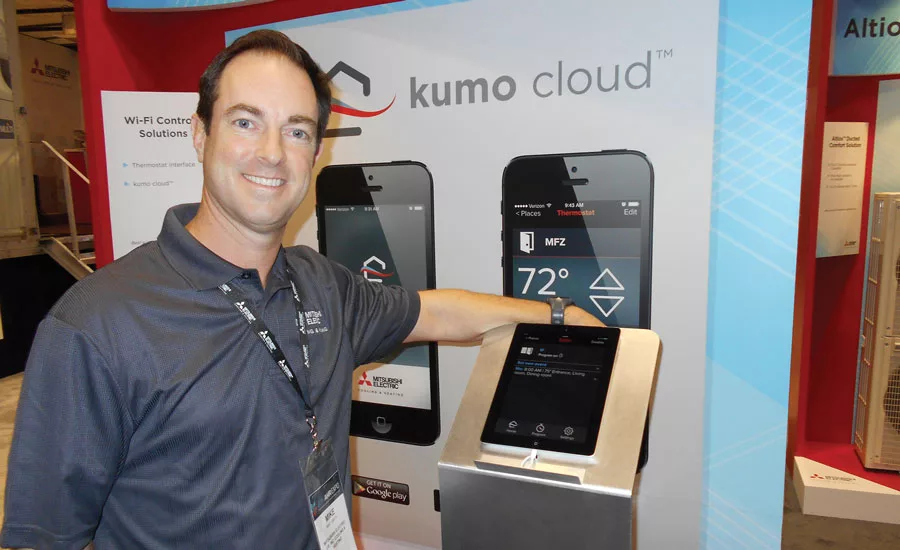 Mike Smith, senior marketing manager, residential, Mitsubishi Electric U.S. Cooling & Heating, shows off the kumo cloud home control system.