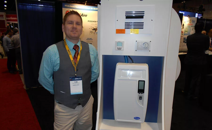 Tom Christensen, tech support and in-house contractor, General Filters, shows off the company’s DS15 electrode steam humidifier.