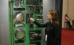 Emily Bavaro, director of marketing, Hilmor, looks over some of the company’s newest tools on display at the AHR Expo.