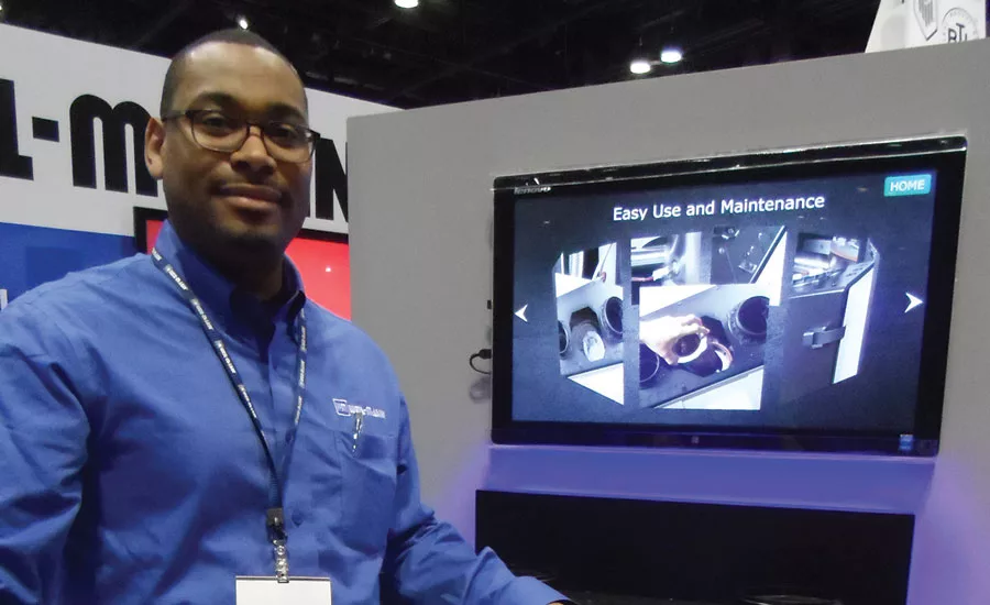 Julian Webb, product manager, demonstrated how Weil-McLain’s new Evergreen boiler is easy to install, use, and maintain.