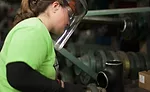 Christina Hadjer, a pipefitter at MMC, works in the mechanical contractor’s fabrication shop.