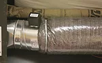 A round bypass damper was installed in this home to increase comfort.