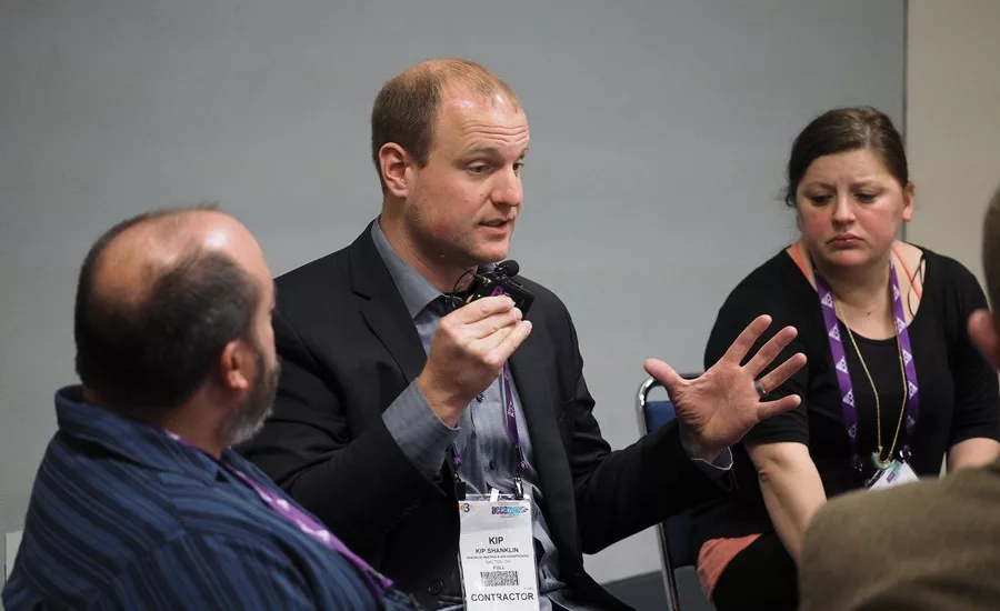 Kip Shanklin (center), owner of Shanklin Heating & Air Conditioning in Dalton, Ohio, participates in a discussion during a session at ACCA 2016.