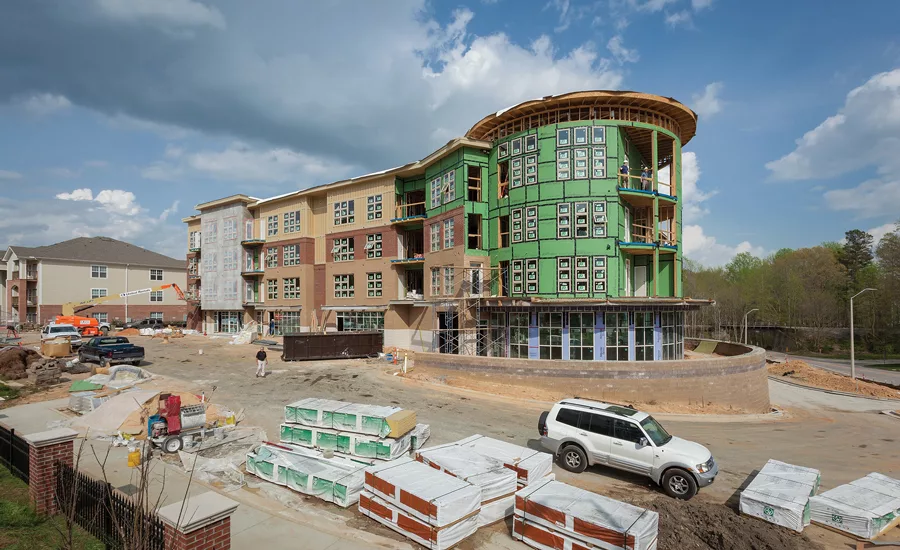The latest addition to the Chatham Pointe development is a 59-unit, mixed-use building that features split heating and cooling as well as condensing tankless water heaters.