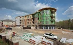 The latest addition to the Chatham Pointe development is a 59-unit, mixed-use building that features split heating and cooling as well as condensing tankless water heaters.