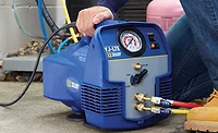FAMILIAR SIGHT Refrigerant recovery is likely to remain a part of the industry, even in the age of naturals and hydrocarbons. Photo courtesy of Ritchie Engineering Co.