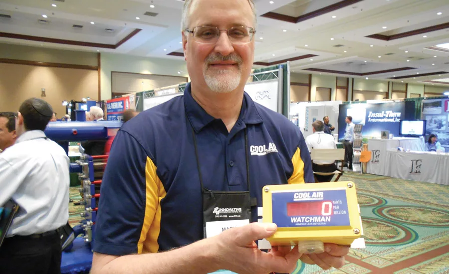 Mark Carlyle, sales engineer, Cool Air Inc., holds an LBW-Watchman ammonia leak detector.