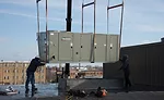 Modine’s Atherion packaged rooftop ventilation system utilizes digital scroll compressors, a microchannel condenser coil, an electronic expansion valve, and modulating hot gas reheat.
