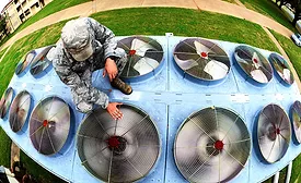 checking an HVAC system at Barksdale Air Force Base
