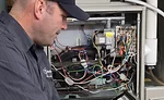 A technician accesses Nortek’s online technical library in the field